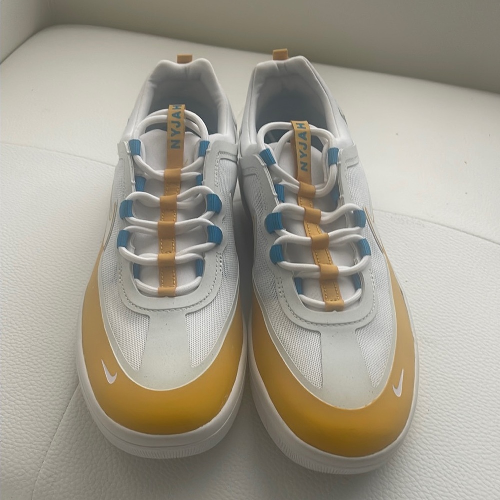 Nike White and Yellow Sneakers with Blue Details. No box.
